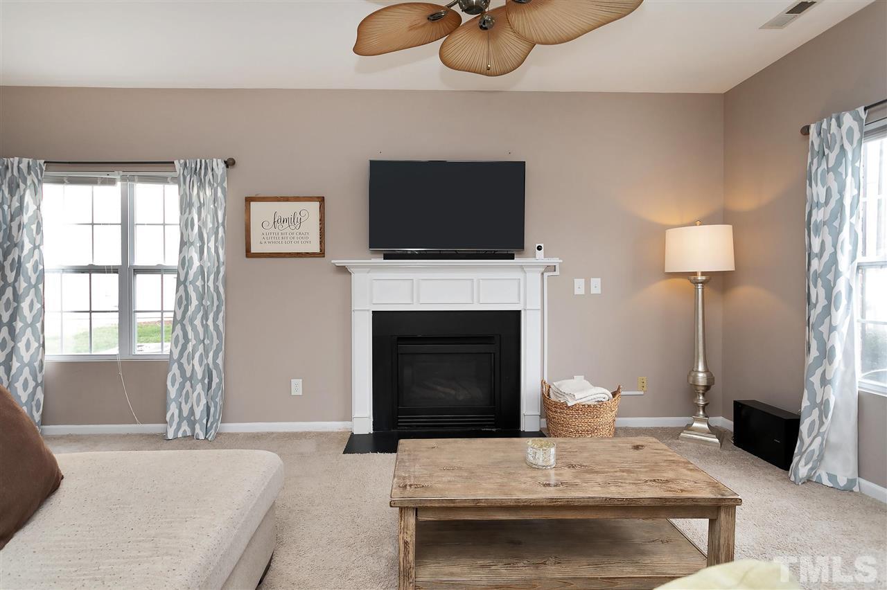 3370 Bridgeville Road Raleigh, NC 27610 - Photo 8 of 30 You'll spend cozy nights in front of your gas log fireplace.