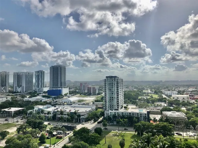 a view of a city from a balcony