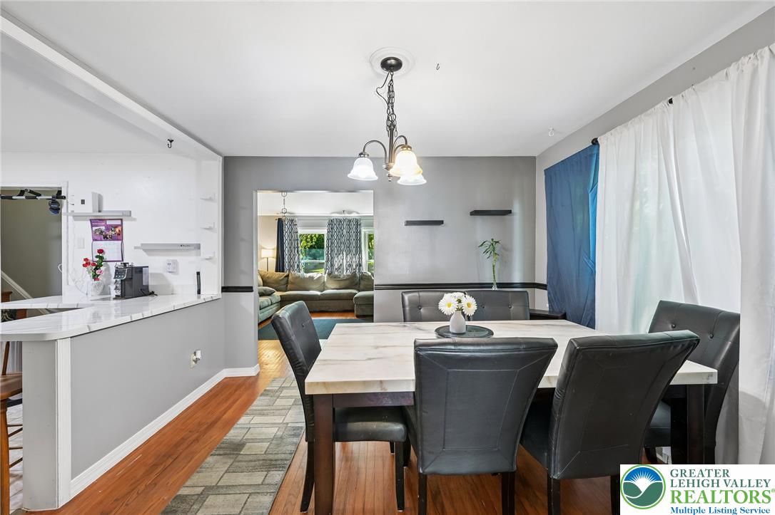 2649 Nottingham Road Bethlehem, PA 18017 - Photo 12 of 49 An inviting dining area flows seamlessly into the living space, perfect for entertaining.