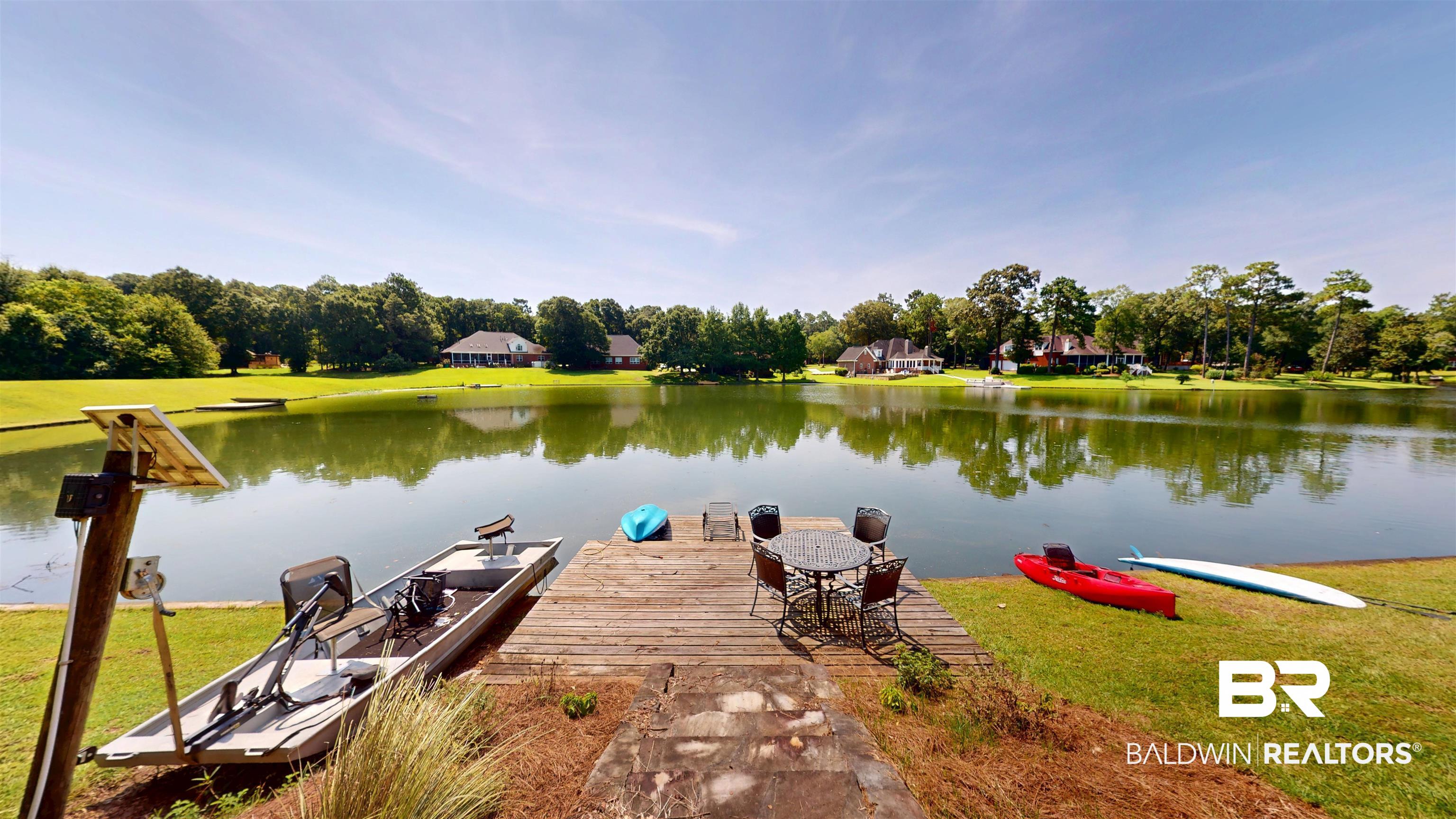 8775 Dawes Lake Road North Mobile, AL 36619 - Photo 56 of 59 Dock area with a water view and view of scattered trees