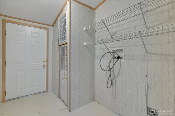 a bathroom with a glass shower door