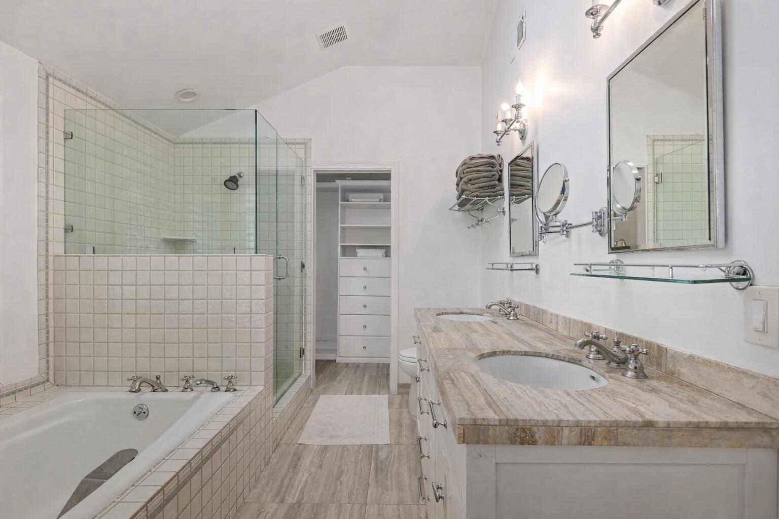 636 Oak Grove Drive Montecito, CA 93108 - Photo 12 of 17 a bathroom with a tub sink and mirror