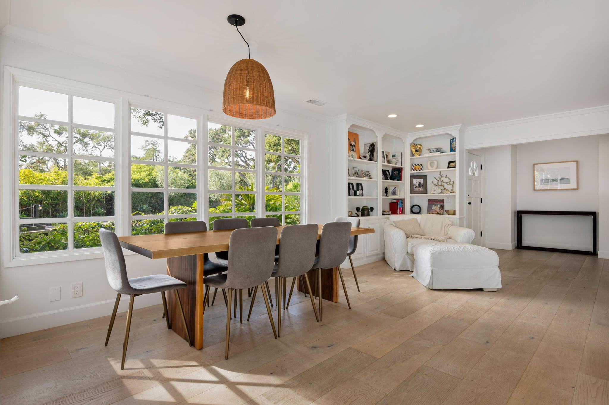 636 Oak Grove Drive Montecito, CA 93108 - Photo 5 of 17 a dining room with furniture a rug and a large window