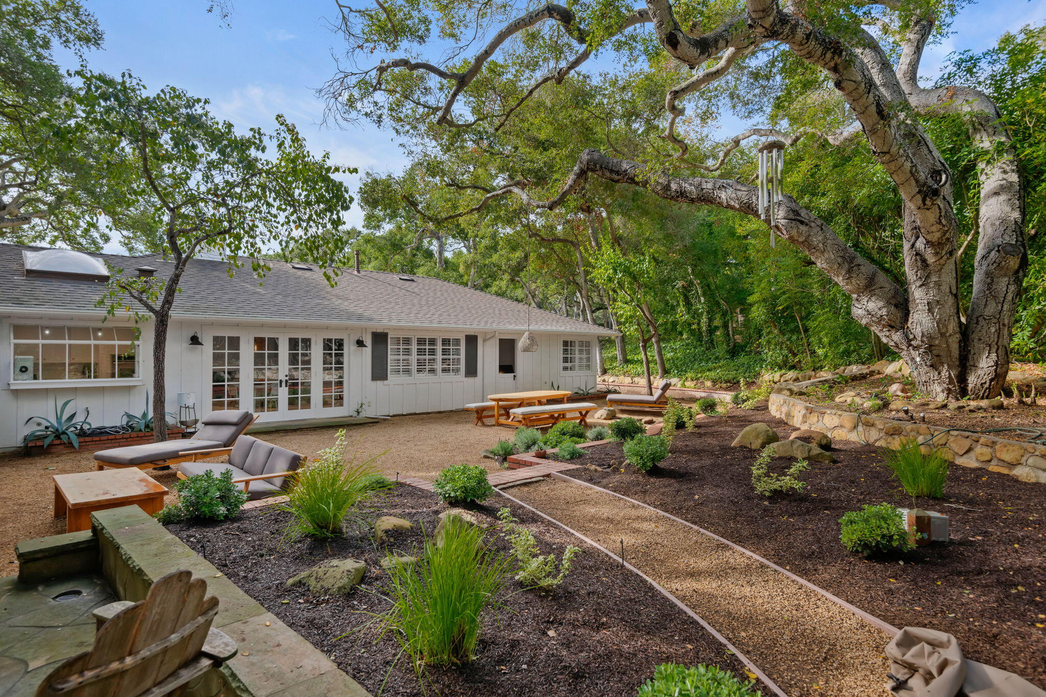 636 Oak Grove Drive Montecito, CA 93108 - Photo 9 of 17 a front view of a house with garden