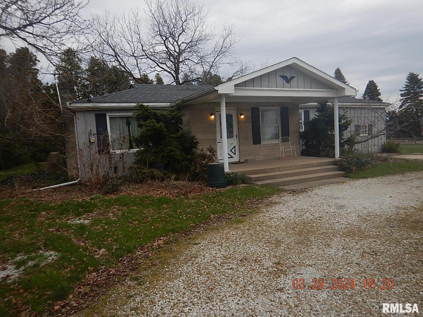 29470 Saxon Road Galva, IL 61434 - Photo 1 of 23 a front view of a house with garden