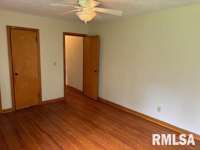 29470 Saxon Road Galva, IL 61434 - Photo 13 of 23 a view of an empty room with wooden floor