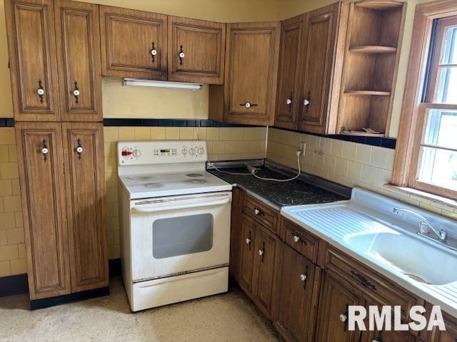 29470 Saxon Road Galva, IL 61434 - Photo 16 of 23 a kitchen with appliances and cabinets