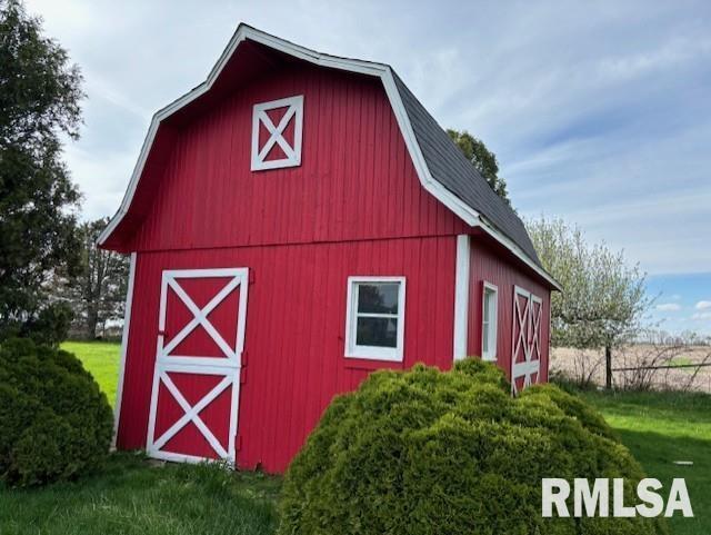29470 Saxon Road Galva, IL 61434 - Photo 21 of 23 a view of a yard in front of a house