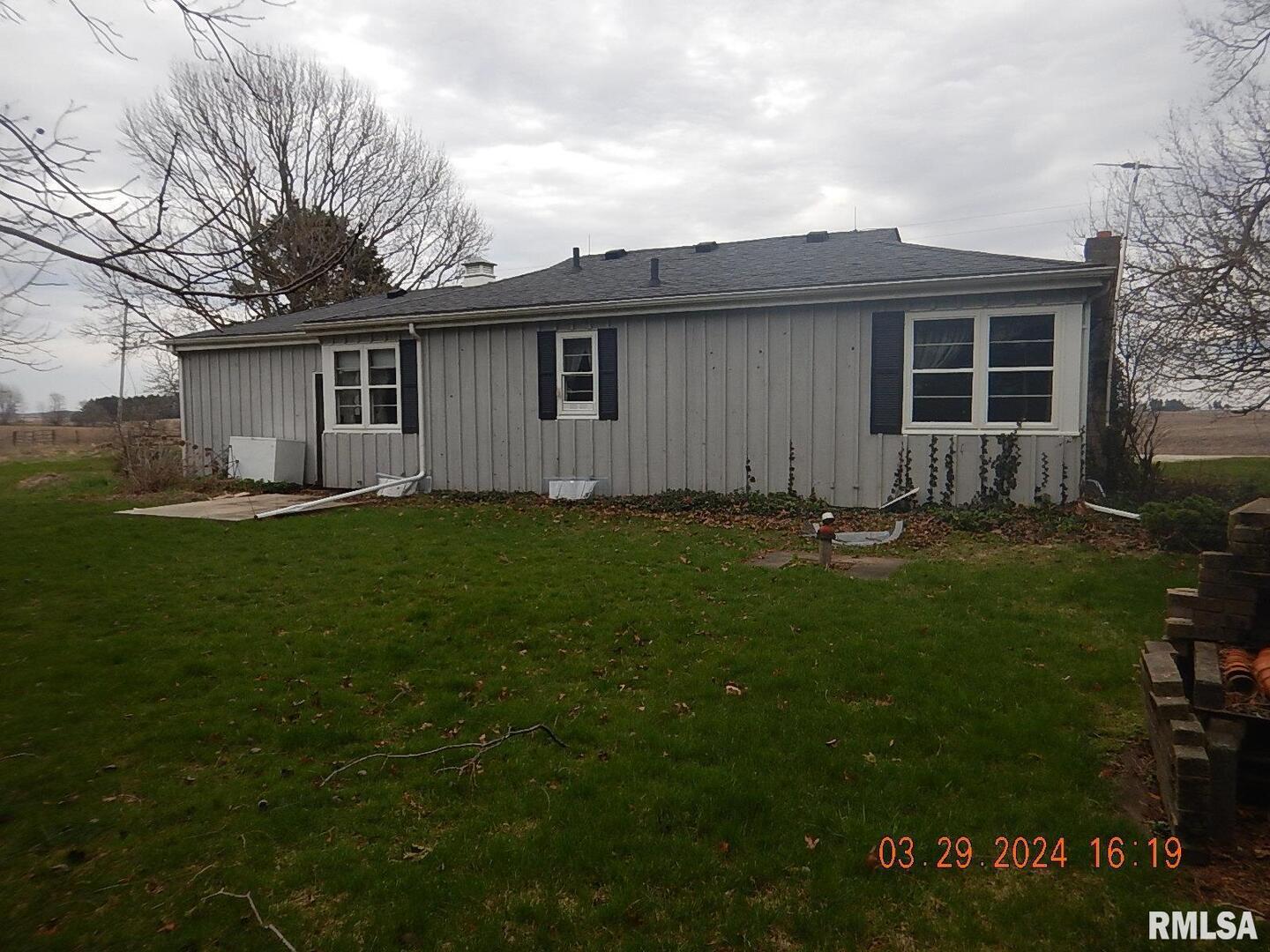 29470 Saxon Road Galva, IL 61434 - Photo 4 of 23 a front view of house with yard and green space