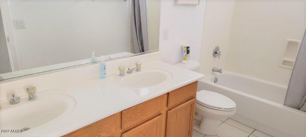 16835 South 15th Avenue Phoenix, AZ 85045 - Photo 15 of 24 a bathroom with a sink a toilet and bathtub