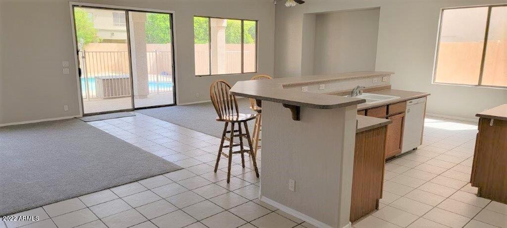 16835 South 15th Avenue Phoenix, AZ 85045 - Photo 5 of 24 a dining room with furniture and a window