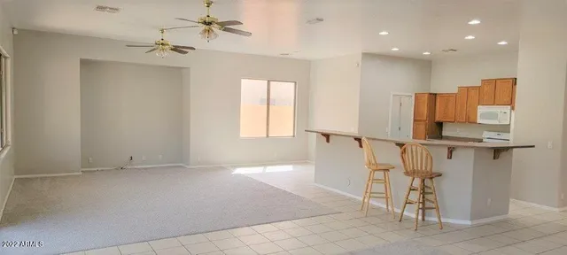 a view of entryway and kitchen