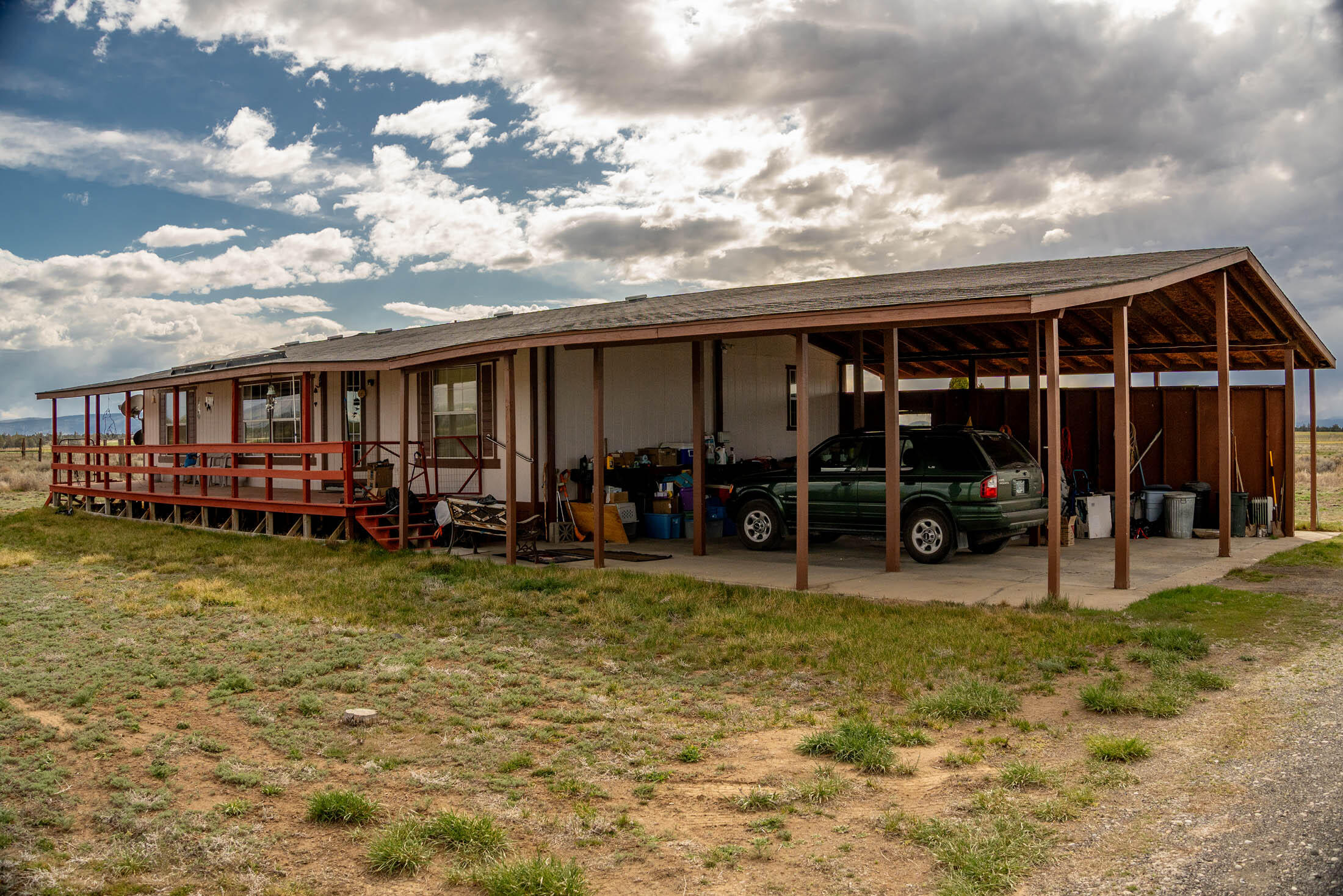 25907 South Cooper Street Bend, OR 97701 - Photo 5 of 34 a view of a yard with table and chairs