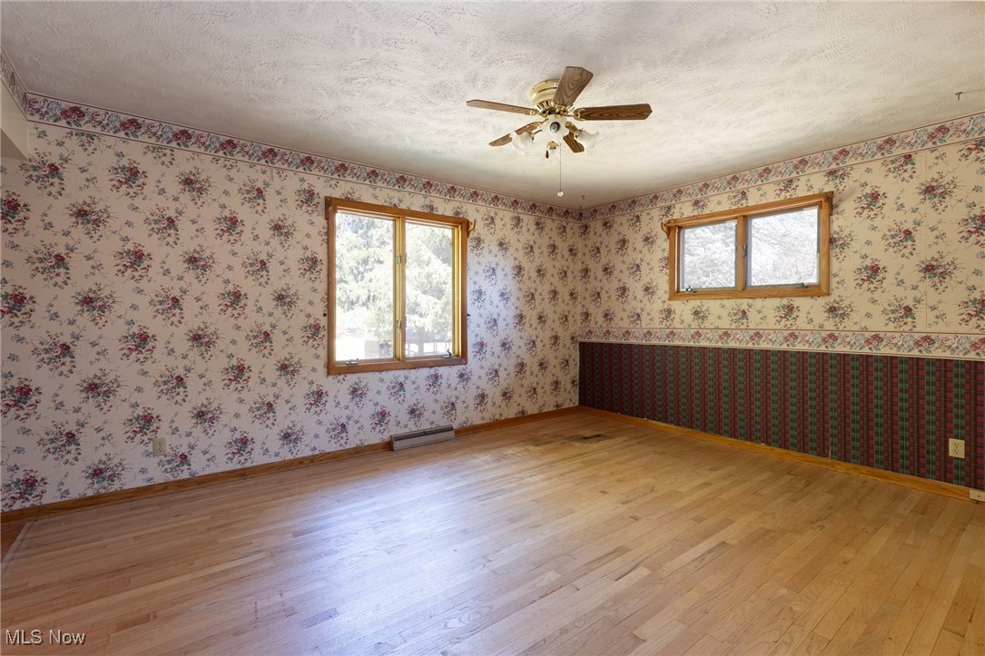 3433 Greenwich Road Barberton, OH 44203 - Photo 15 of 41 This room is 15' x 12', has a large closet, ceiling fan, a hardwood floor and a private entrance to the main bath.
