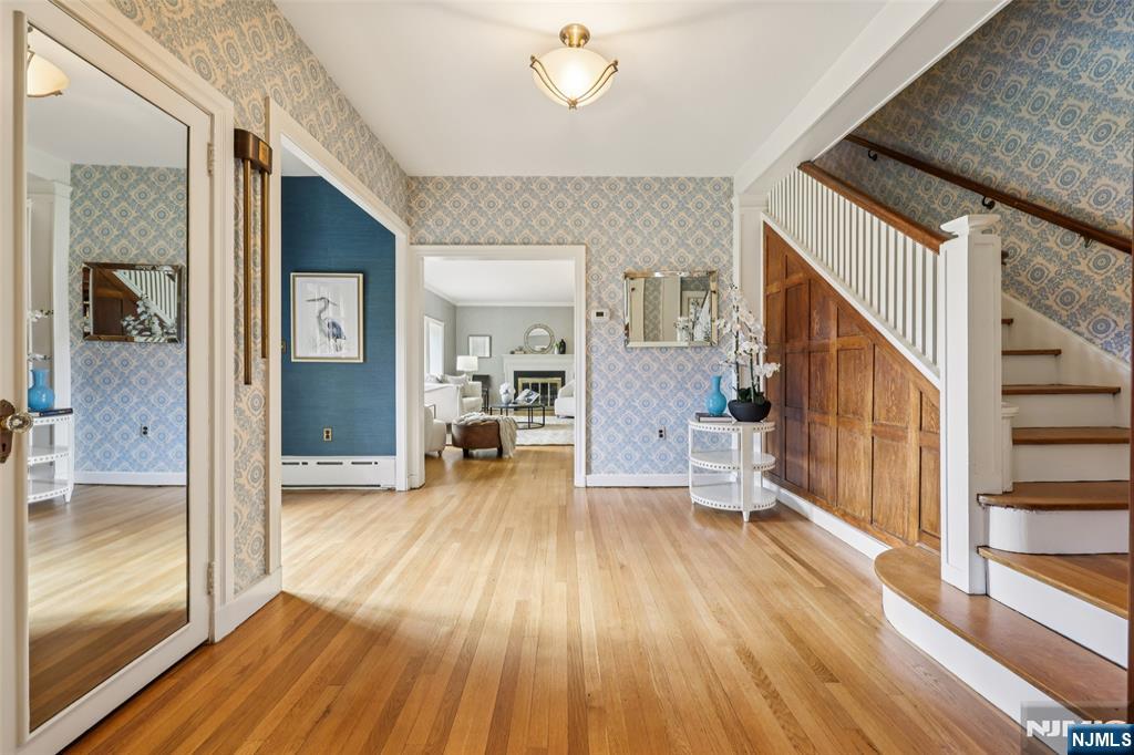 119 Sheridan Terrace Ridgewood, NJ 07450 - Photo 3 of 44 a view of a livingroom with wooden floor and furniture