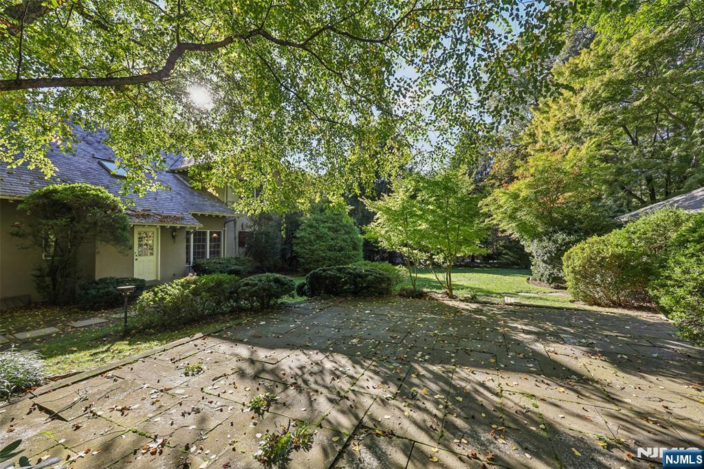119 Sheridan Terrace Ridgewood, NJ 07450 - Photo 41 of 44 a view of a house with a yard