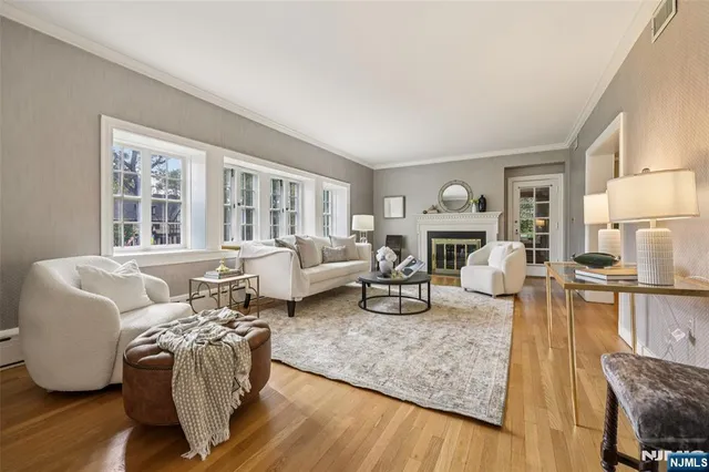 a living room with furniture and a table