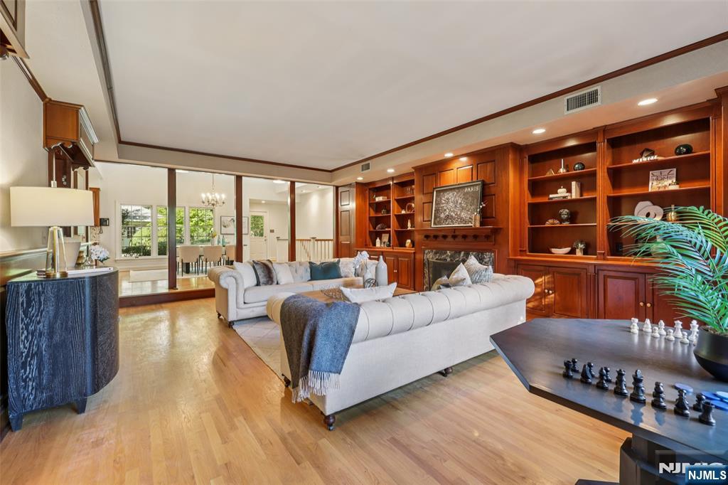 119 Sheridan Terrace Ridgewood, NJ 07450 - Photo 9 of 44 a living room with furniture and a large window