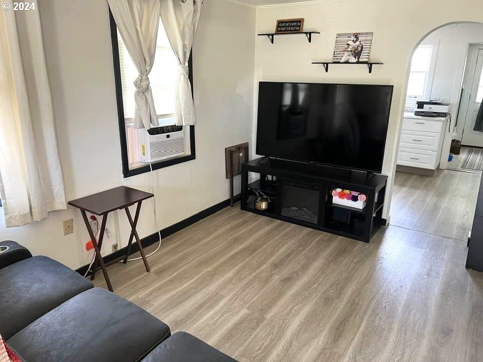826 Southeast 8th Street Pendleton, OR 97801 - Photo 6 of 13 a living room with furniture and a flat screen tv
