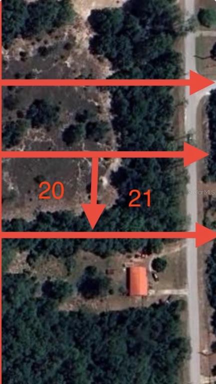 20 Southwest Azalea Court Dunnellon, FL 34431 - Photo 2 of 5 an outdoor space with wooden