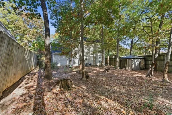 a backyard of a house with seating space