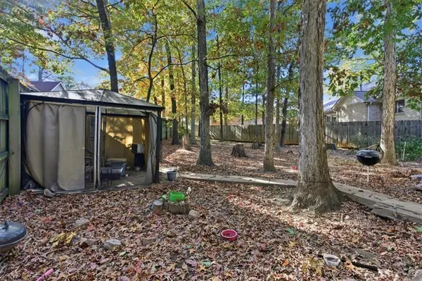 a backyard of a house with seating space