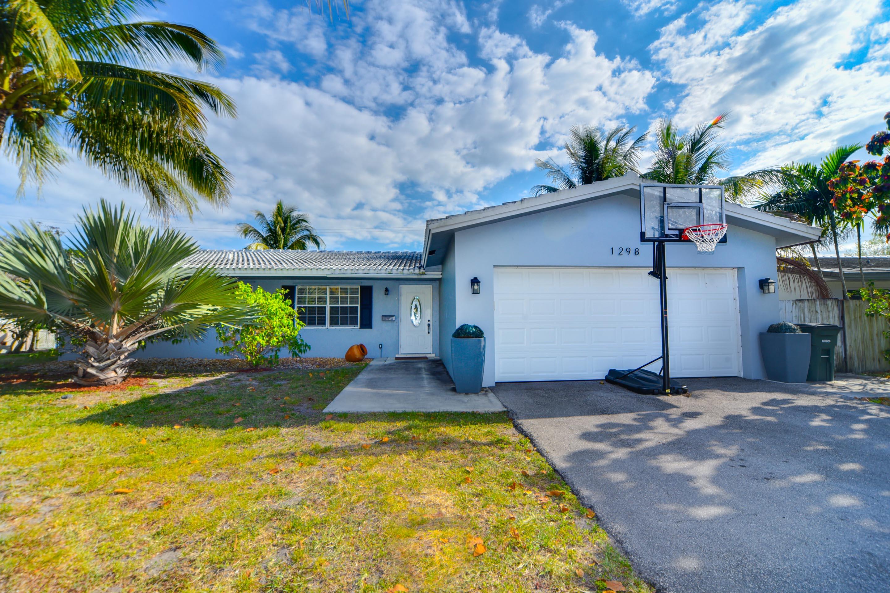 1298 Southwest 13th Street Boca Raton, FL 33486 - Photo 1 of 28 01 Front Exterior