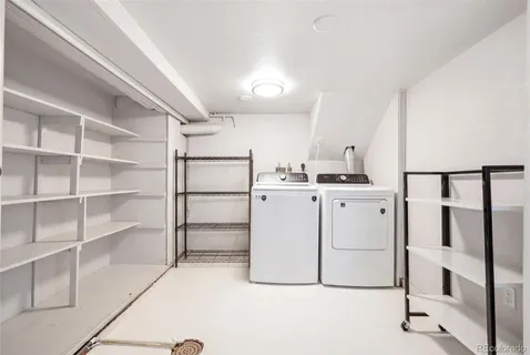 a view of an empty room with windows