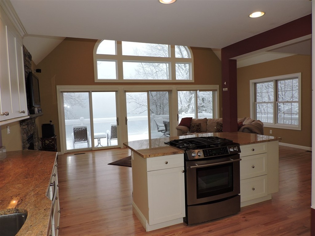 8 Reid Smith Cove Road Webster, MA 01570 - Photo 11 of 30 a kitchen with stainless steel appliances a stove and a large window