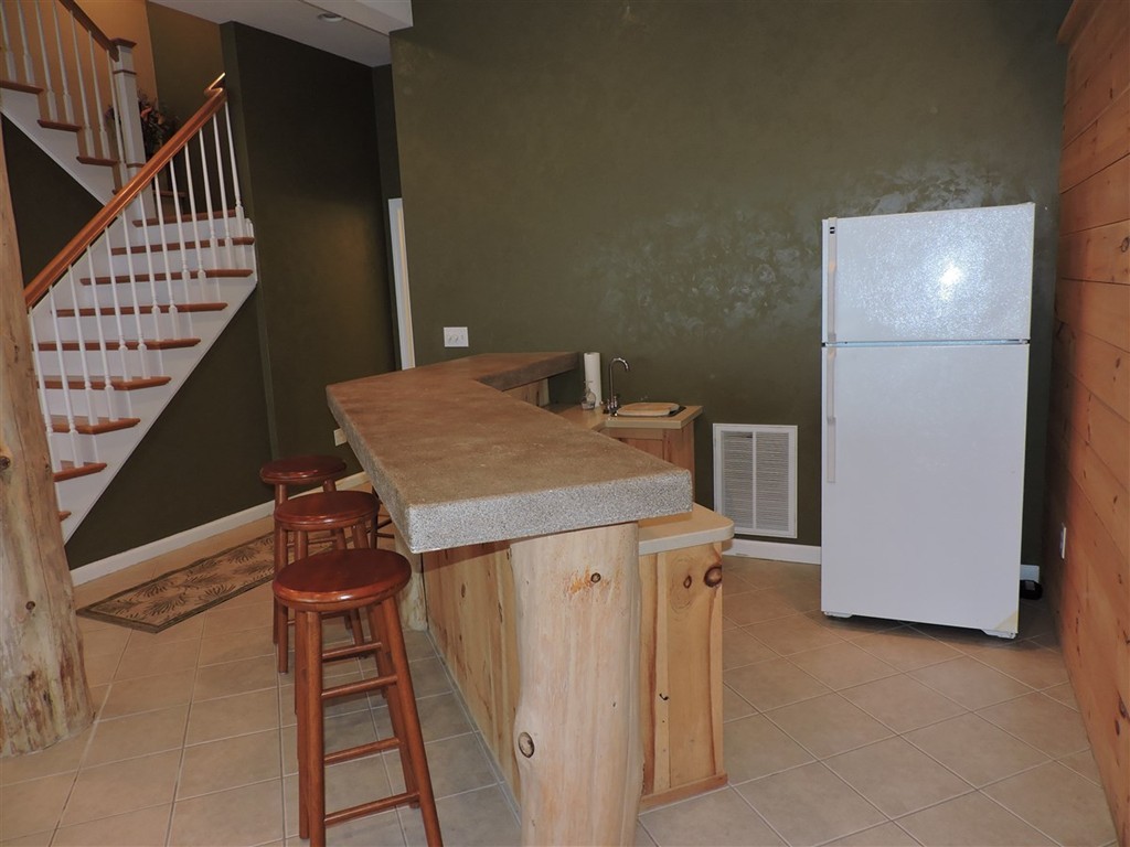 8 Reid Smith Cove Road Webster, MA 01570 - Photo 26 of 30 a view of a livingroom with furniture and staircase