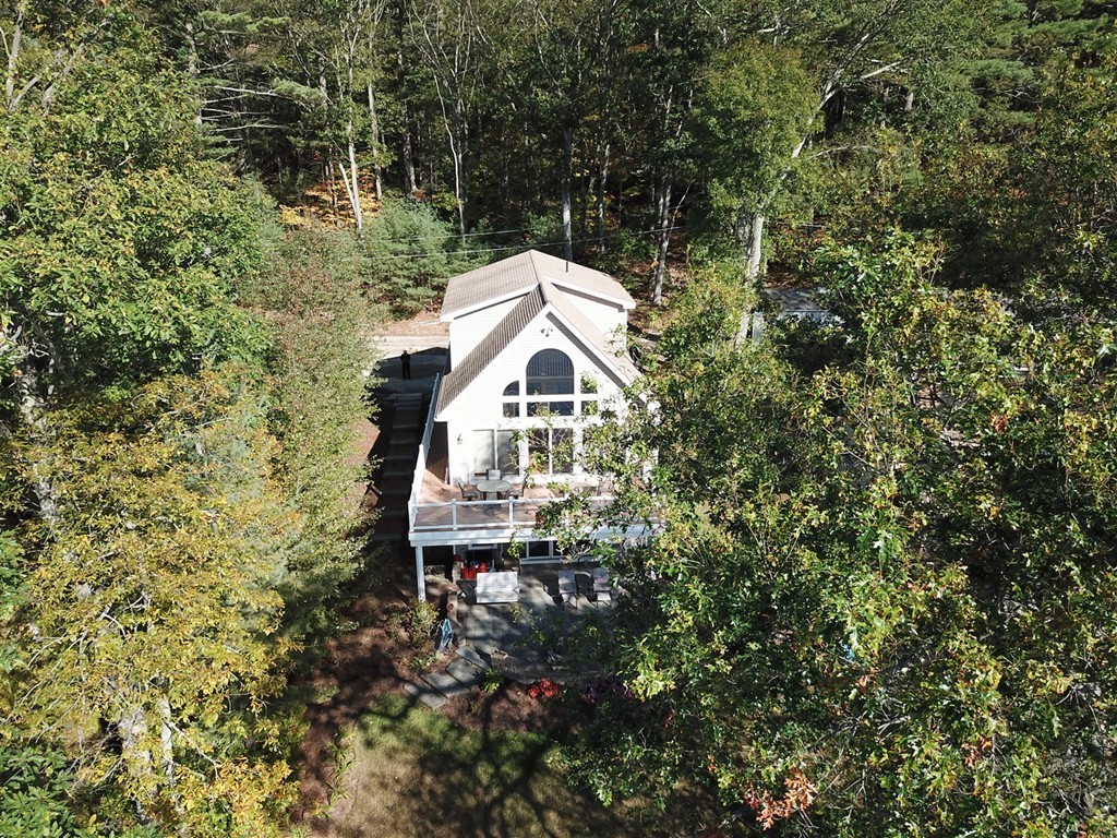 8 Reid Smith Cove Road Webster, MA 01570 - Photo 6 of 30 a aerial view of a house with a yard