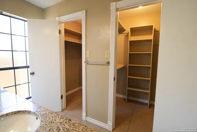 a bathroom with a sink and a shower
