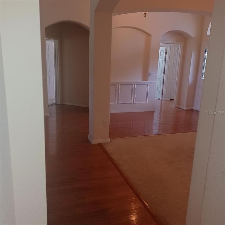 3807 Beacon Ridge Way Clermont, FL 34711 - Photo 5 of 15 view of a livingroom with wooden floor