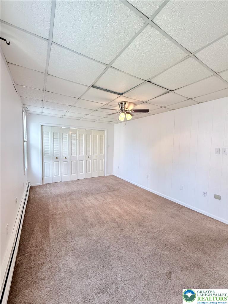 5540 Main Street Whitehall, PA 18052 - Photo 33 of 53 Primary bedroom features soft carpeting and ample closet space.