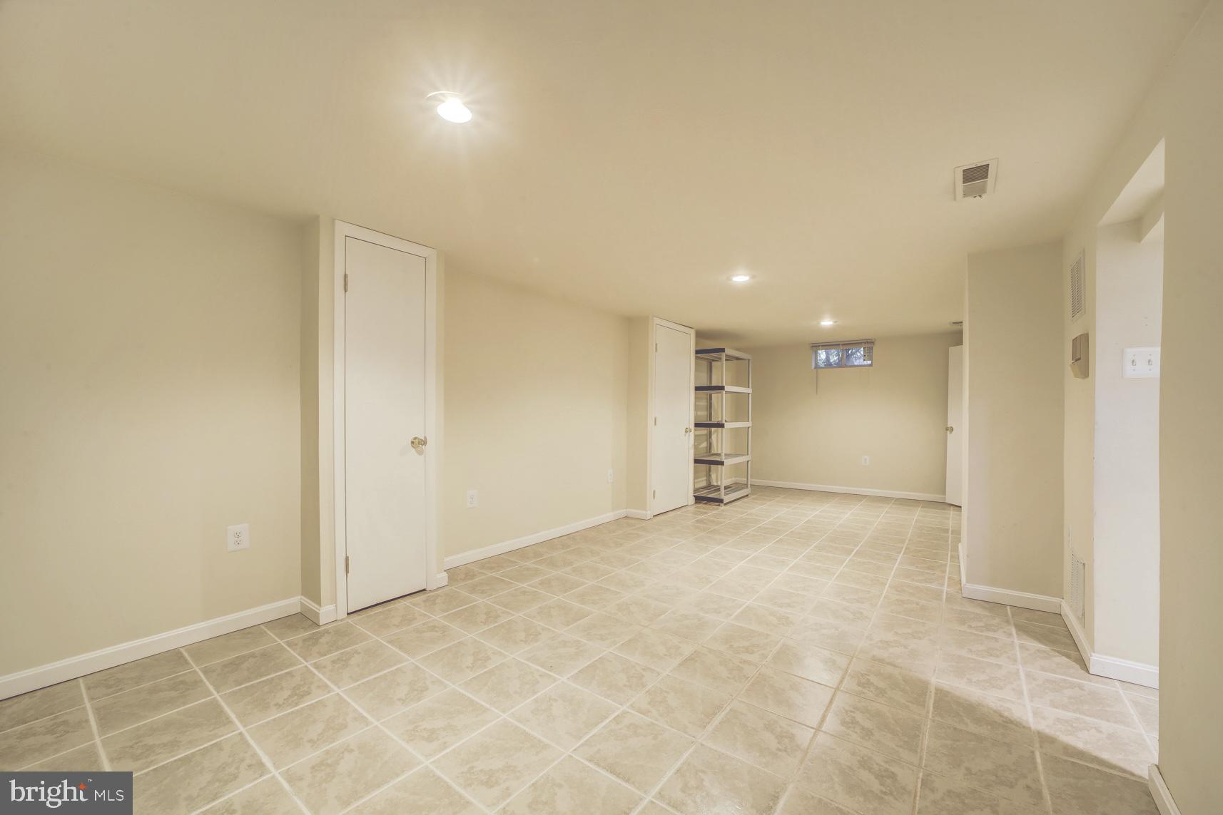 12216 Charles Road Silver Spring, MD 20906 - Photo 15 of 22 a view of an empty room