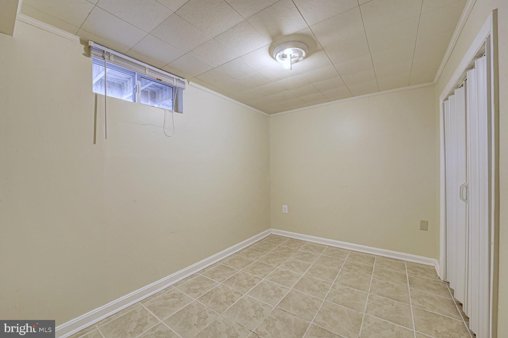 12216 Charles Road Silver Spring, MD 20906 - Photo 16 of 22 a view of an empty room