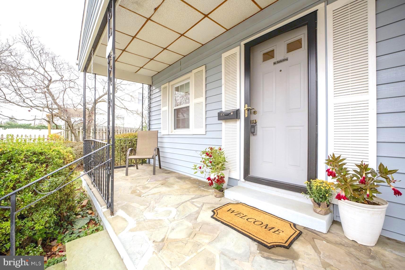 12216 Charles Road Silver Spring, MD 20906 - Photo 2 of 23 Lounge-worthy front porch