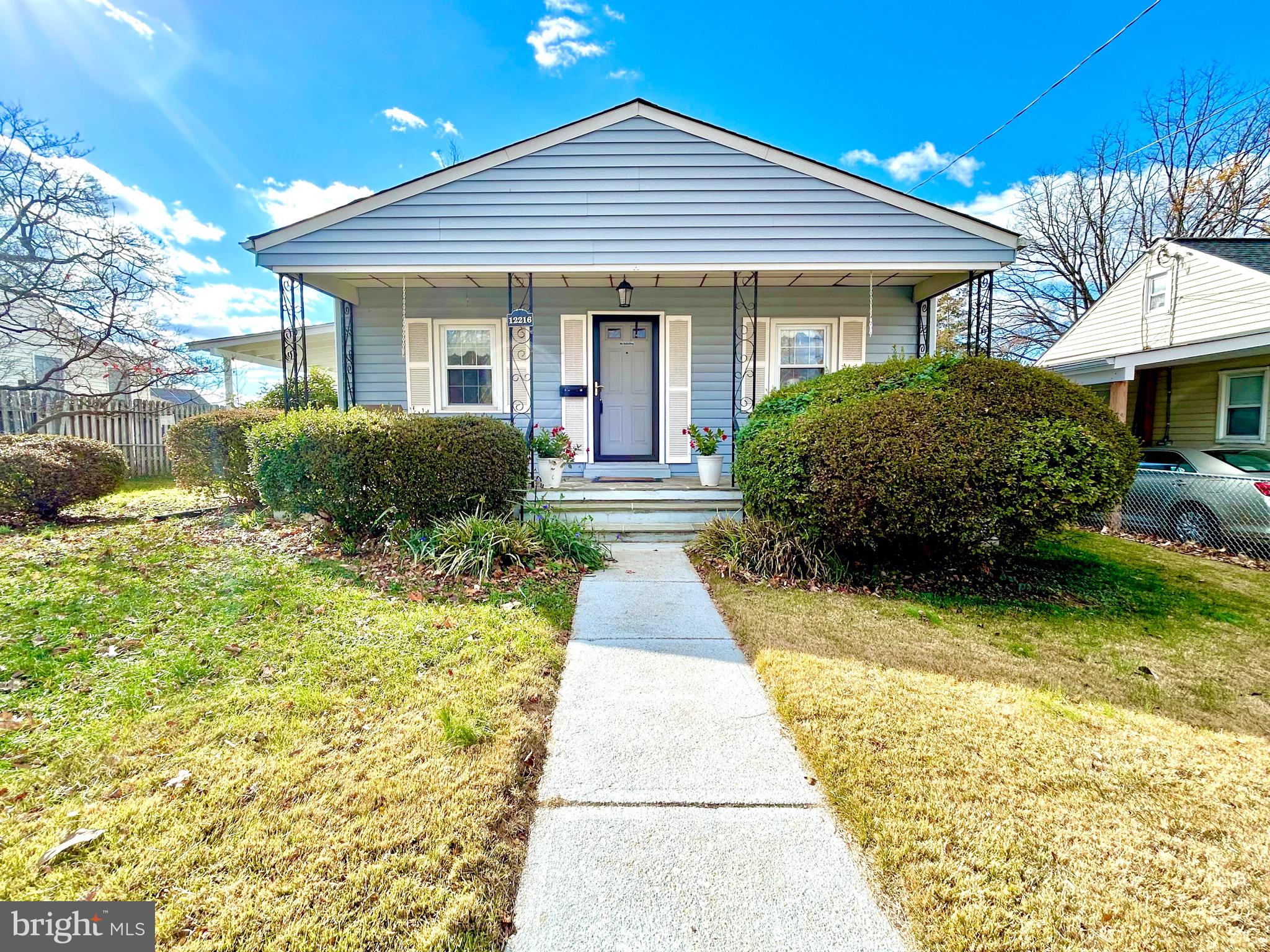 12216 Charles Road Silver Spring, MD 20906 - Photo 23 of 23 a view of a house with a yard