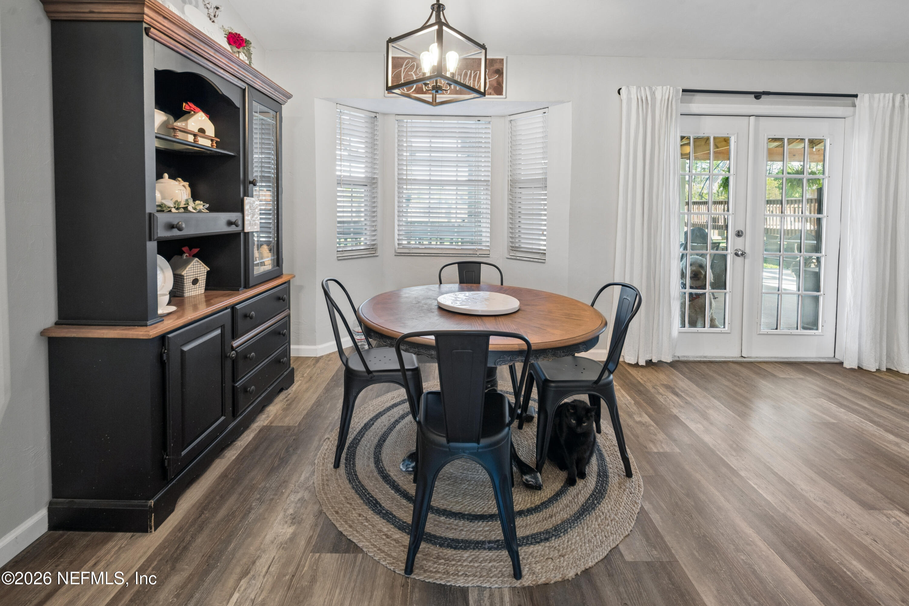 1659 Highway 230 Starke, FL 32091 - Photo 12 of 48 a view of a dining room with furniture and window