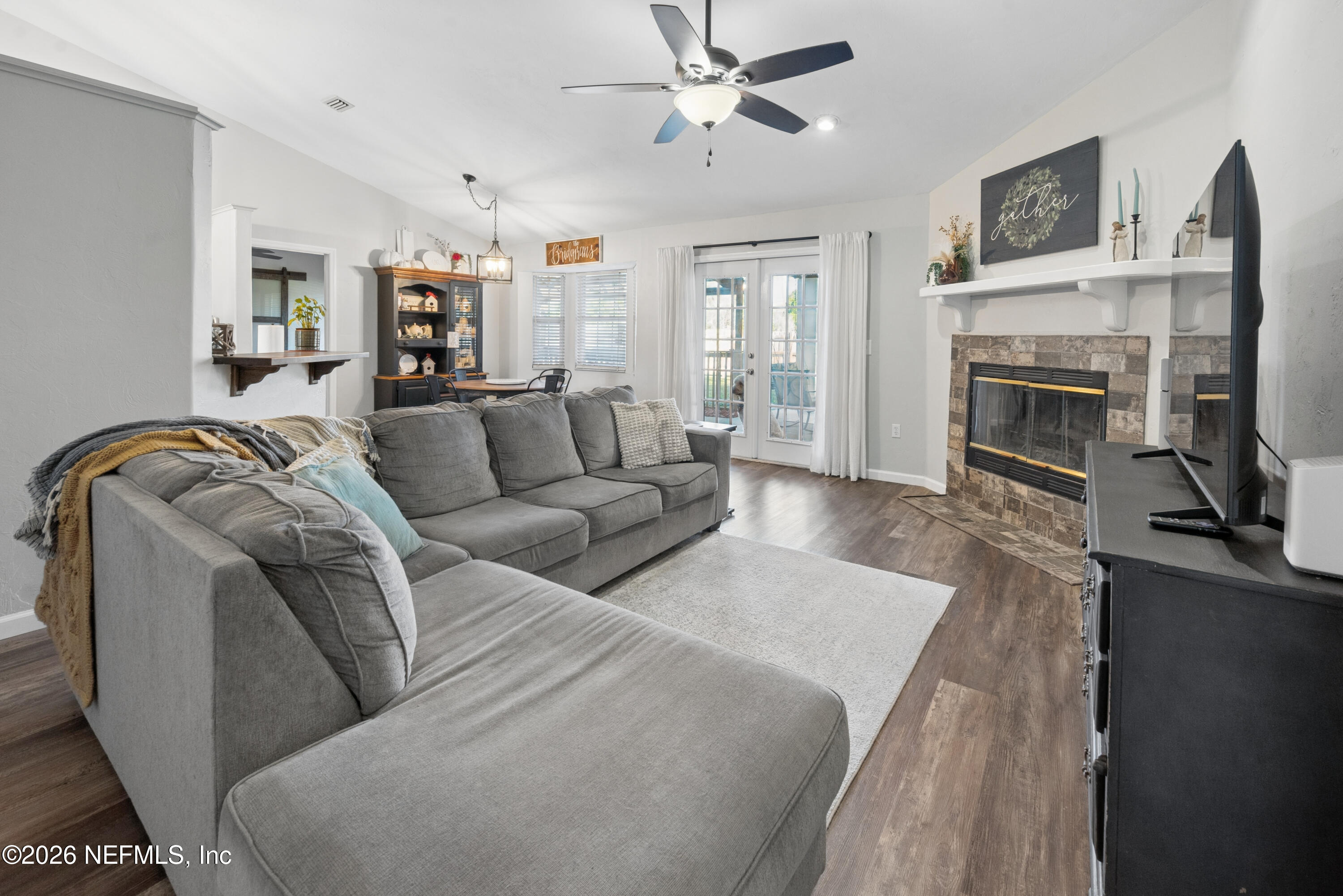 1659 Highway 230 Starke, FL 32091 - Photo 14 of 48 a living room with furniture and a fireplace