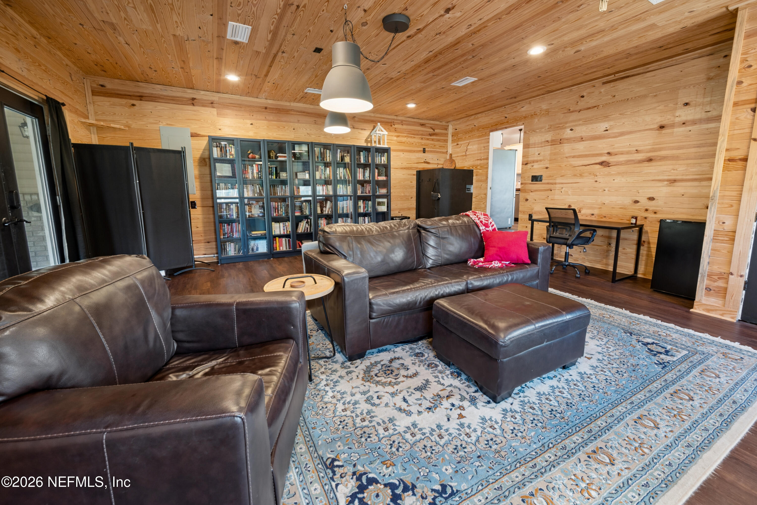 1659 Highway 230 Starke, FL 32091 - Photo 16 of 48 a living room with furniture a ceiling fan and a rug