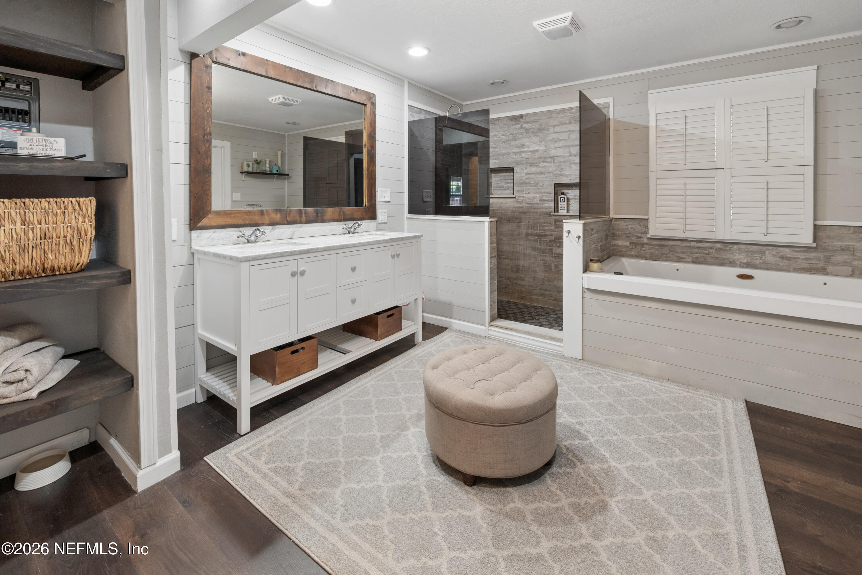 1659 Highway 230 Starke, FL 32091 - Photo 22 of 48 a spacious bathroom with a double vanity sink mirror and bathtub