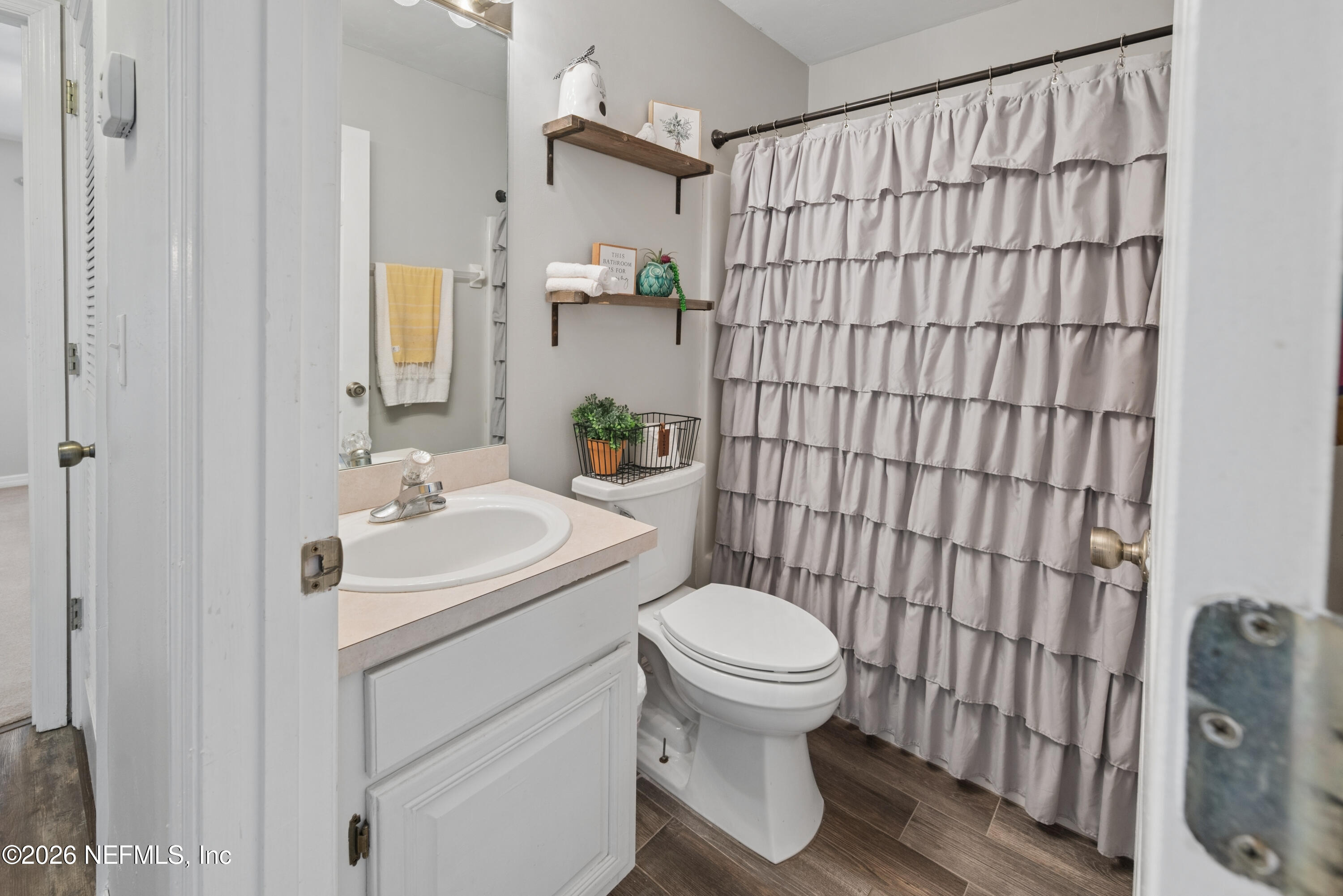 1659 Highway 230 Starke, FL 32091 - Photo 28 of 48 a bathroom with a sink toilet and shower