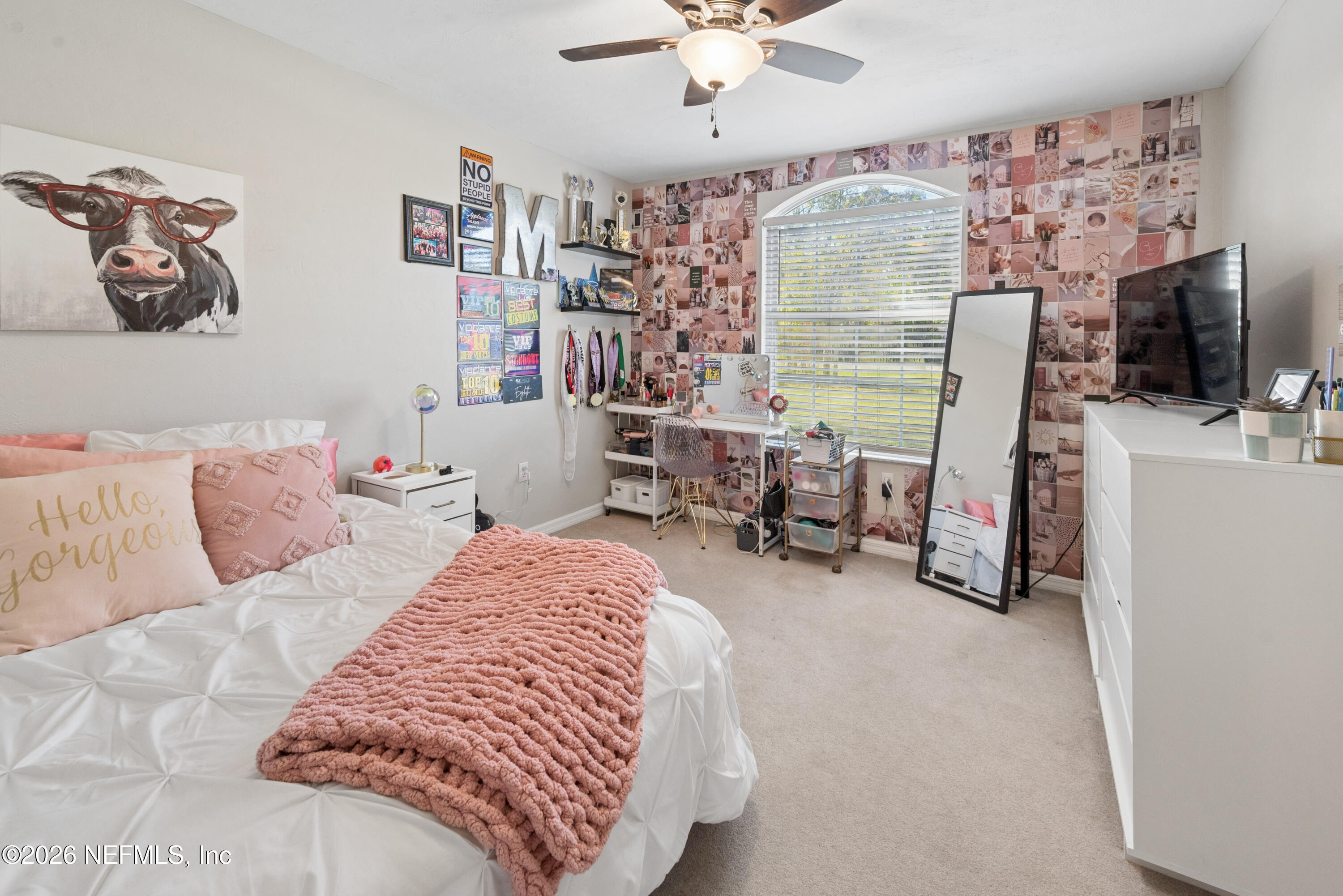 1659 Highway 230 Starke, FL 32091 - Photo 31 of 48 a bedroom with a bed furniture and a flat screen tv