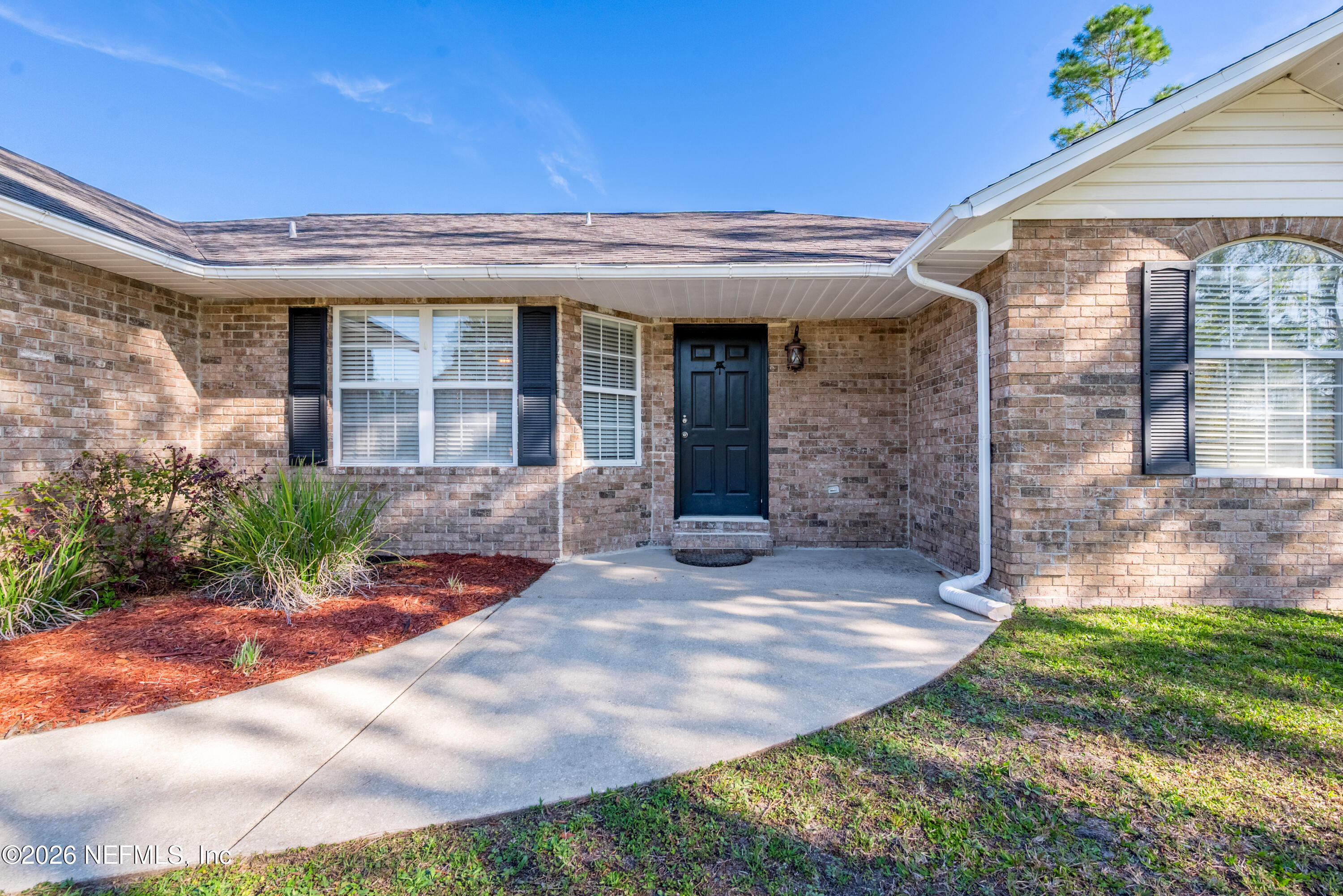1659 Highway 230 Starke, FL 32091 - Photo 33 of 48 a view of a building with a yard