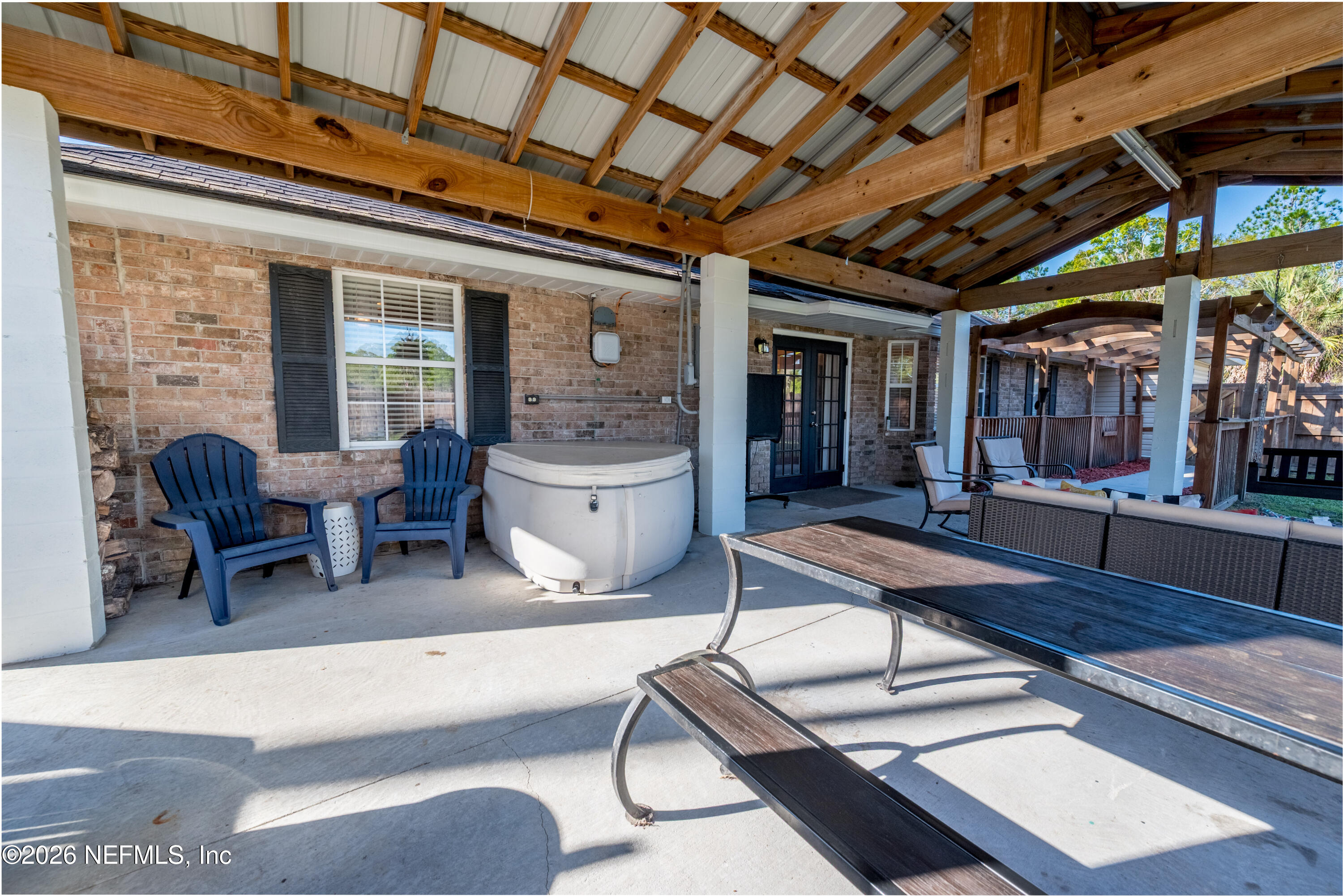 1659 Highway 230 Starke, FL 32091 - Photo 39 of 48 a living room with furniture pool table and a large window