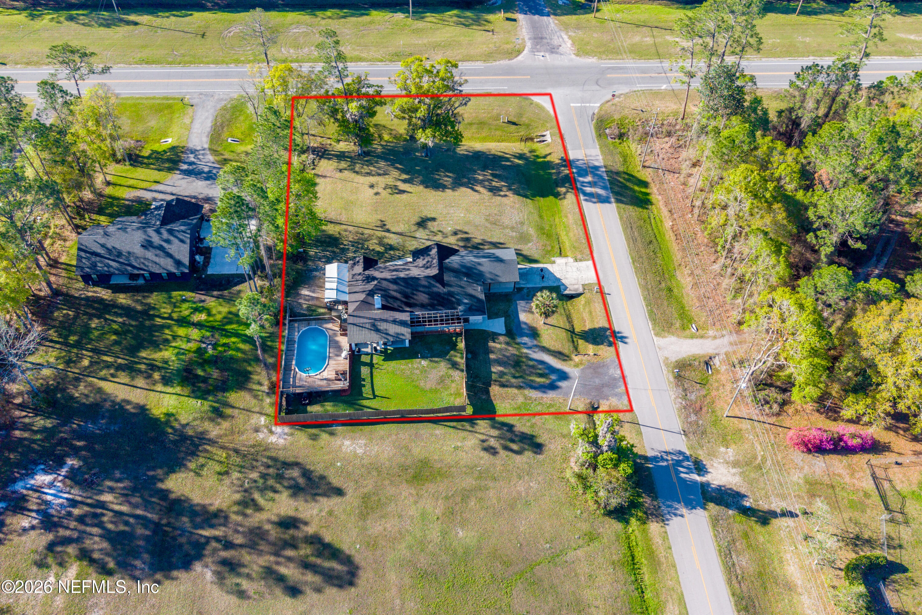 1659 Highway 230 Starke, FL 32091 - Photo 48 of 48 an aerial view of a house with a yard and lake view