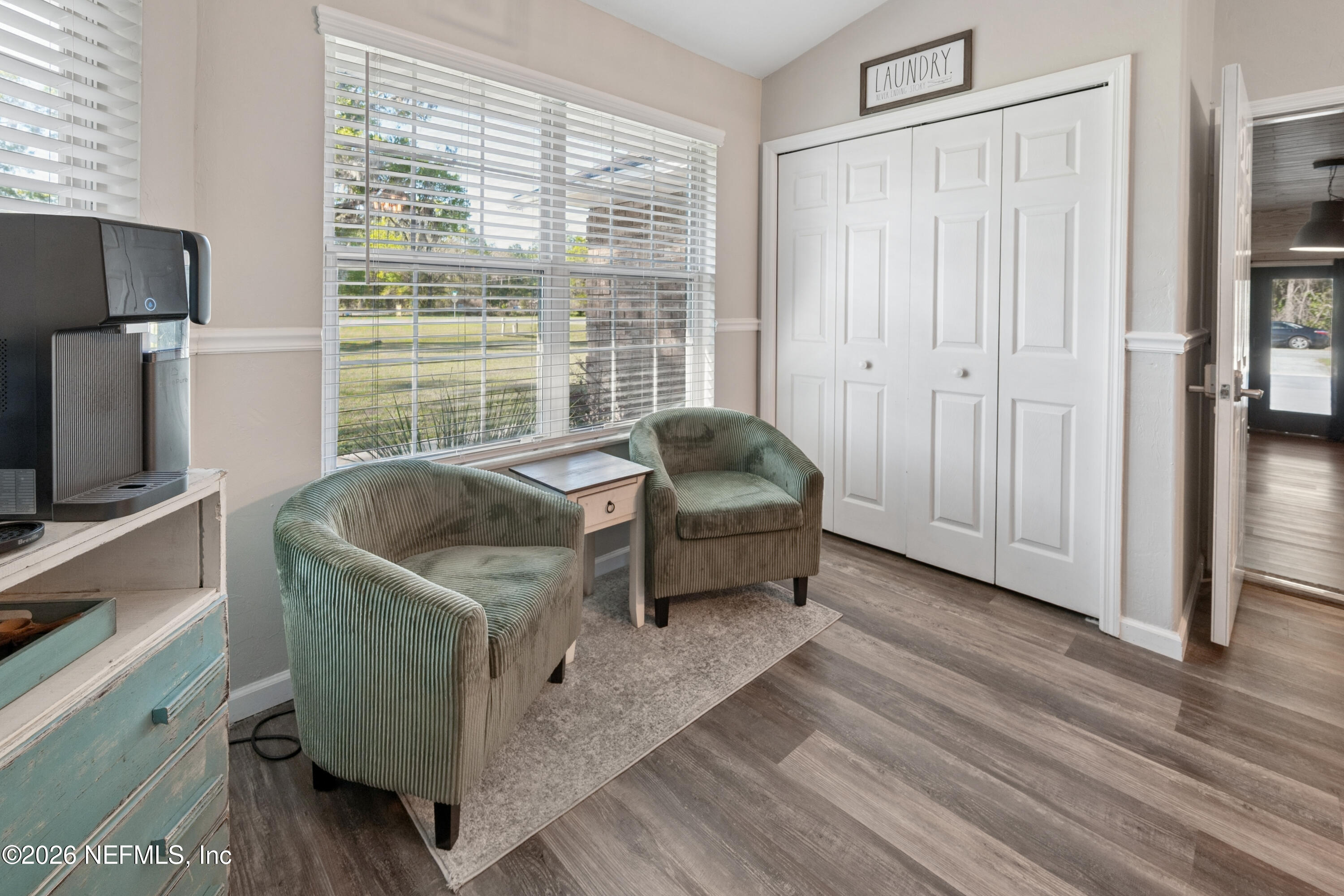 1659 Highway 230 Starke, FL 32091 - Photo 6 of 48 a living room with furniture and a flat screen tv