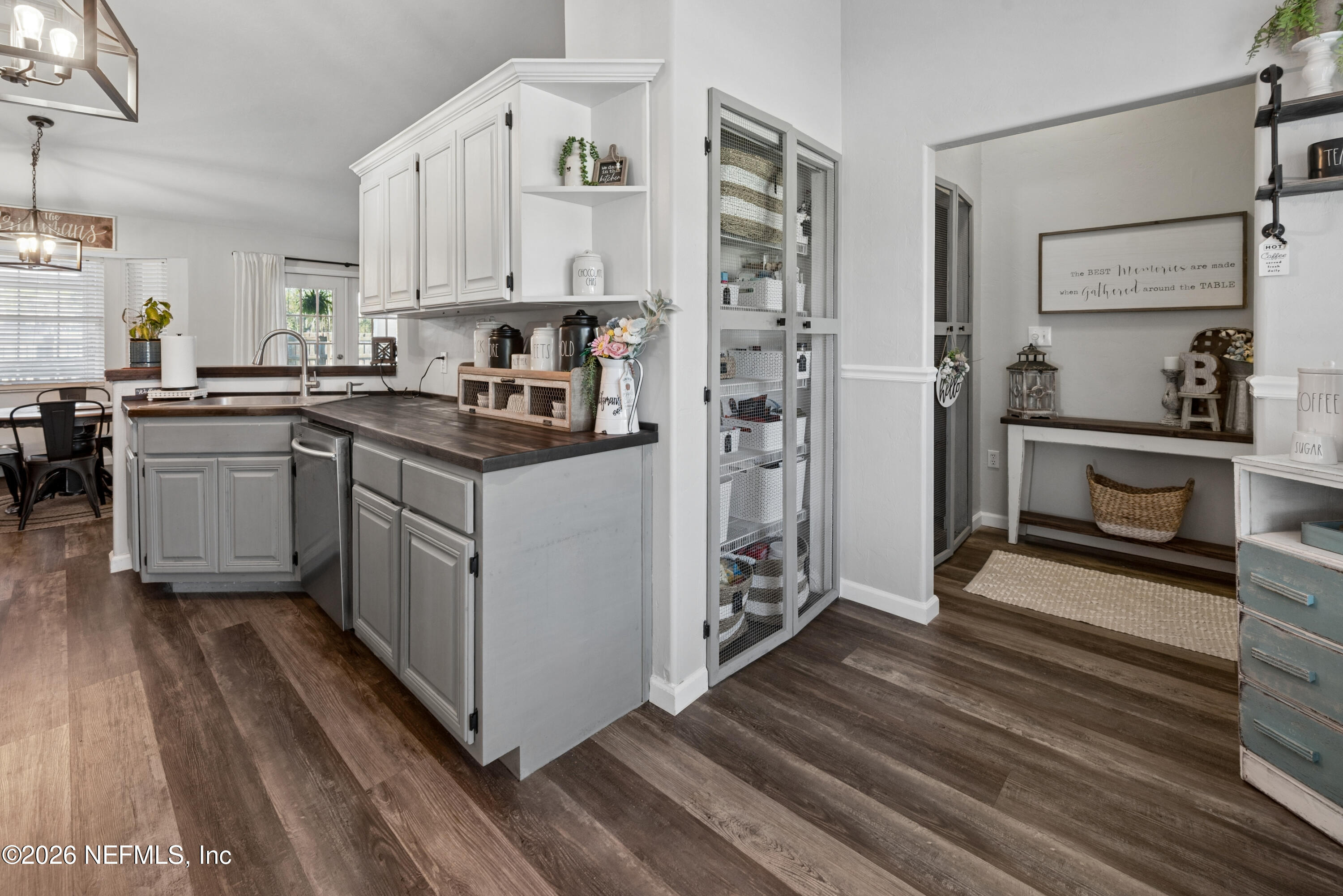 1659 Highway 230 Starke, FL 32091 - Photo 7 of 48 a kitchen with cabinets and wooden floor
