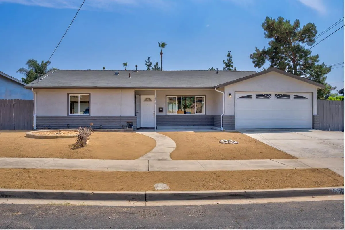 9762 Domer Road Santee, CA 92071 - Photo 1 of 34 a view of a house with swimming pool